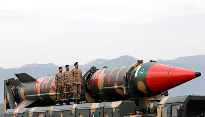 Pakistani military personnel stand next to a Shaheen III surface-to-surface ballistic missile during the Pakistan Day military parade in Islamabad on March 23, 2019. - Reuters