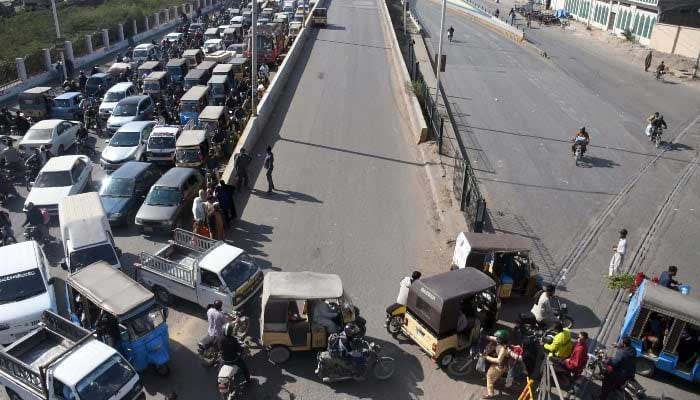 A view of the massive traffic jam on the road leading to Gulistan-e-Johar from Sharea Faisal due to a sit-in protest in Karachi on December 28, 2024. —Online