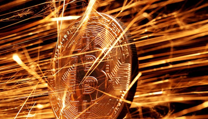 Sparks Strike Representation of Cryptocurrency Bitcoin in this illustration taken on November 24, 2024. - Reuters