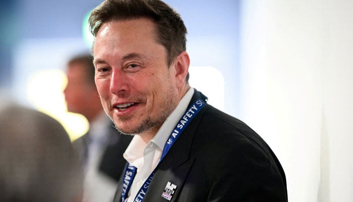 Tesla, X (previously known as Twitter) and the CEO of Spacexs, Elon Musk, speaks with other delegates on the 1st day of AI's Security Summit in Bletchley Park in Bletchley, United Kingdom, November. 1, 2023. - Reuters