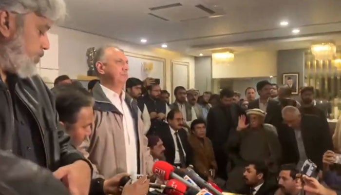 PTI leader, Omar Ayub Khan (third from the left), addresses the press conference after the TTAP meeting in Islamabad on February 27, 2024. - x/@ptioficial/Screengrab