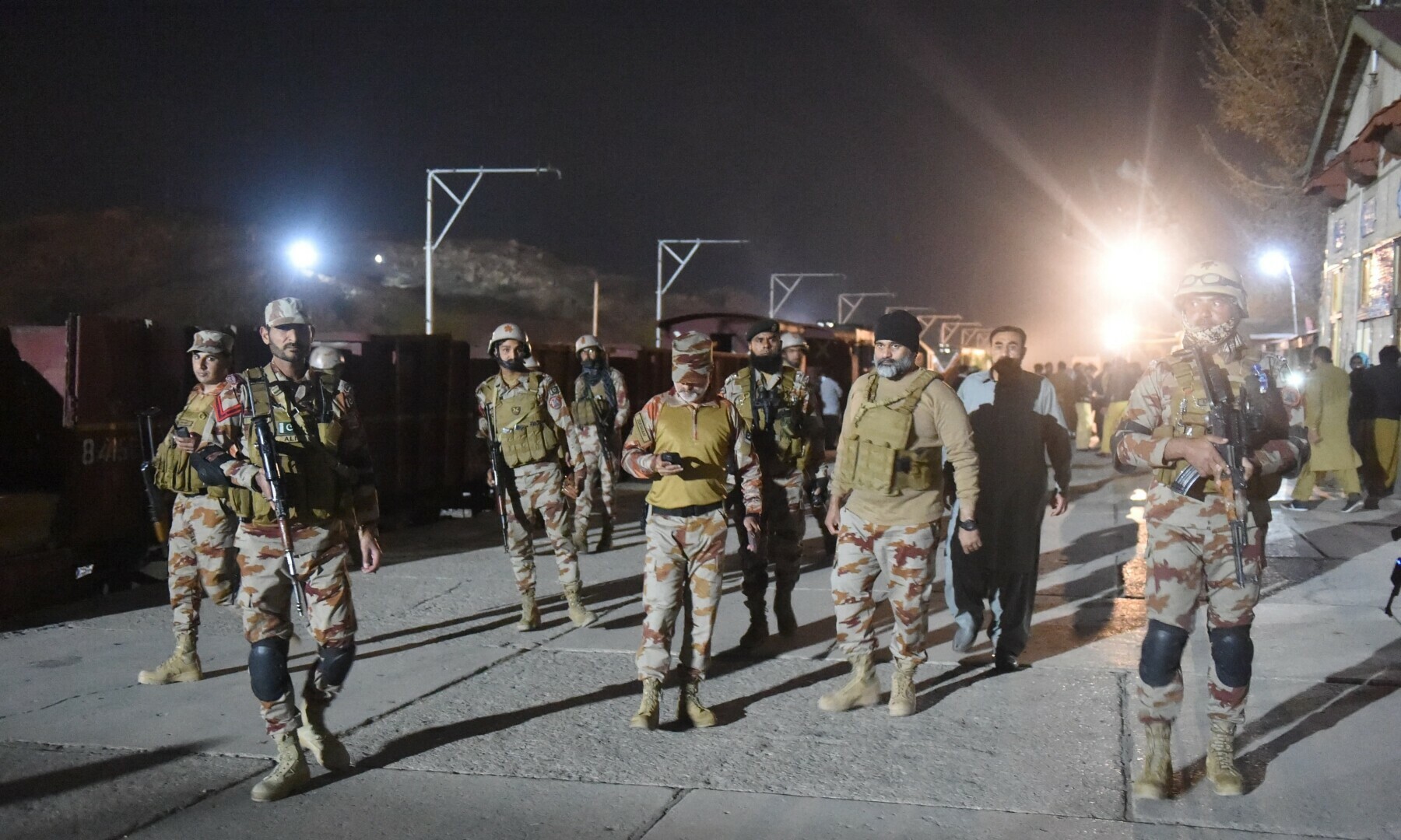     The soldiers claim Mach's train station after the Pakistani security forces released some passengers after a security operation against armed militants that ambushed the train in the remote mountainous area, in Mach, Baluchistan, on March 12, 2025. - AFP 