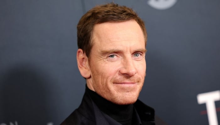 Photo: Michael Fassbender sheds light in hearing 007