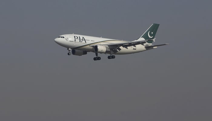 A Pakistan International Airlines passenger plane arrives at Benazir International Airport in Islamabad, December 2, 2015. - Reuters