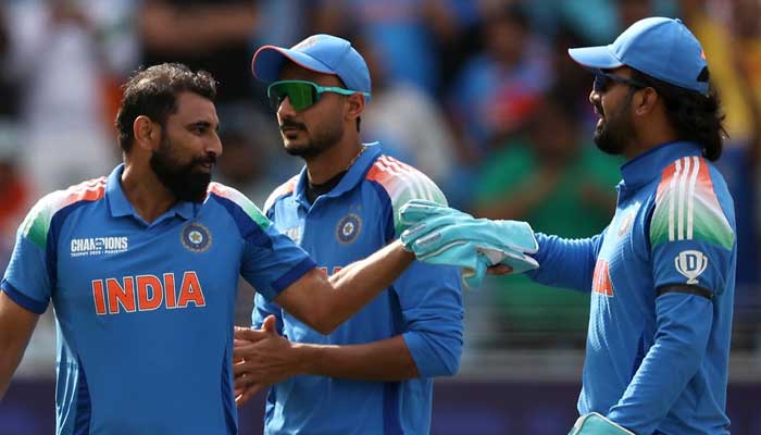 Indian players, Muhammad Shami (right), Axar Patel (center), KL Rahul (left), celebrating during a CPI champions trophy match at Dubai International Stadium. - ICC/File