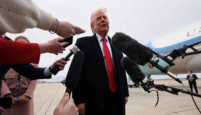 The president of the United States, Donald Trump, speaks with journalists before addressing Air Force One when he departs from the joint base of Andrews in Maryland, USA. UU., March 14, 2025. - Reuters