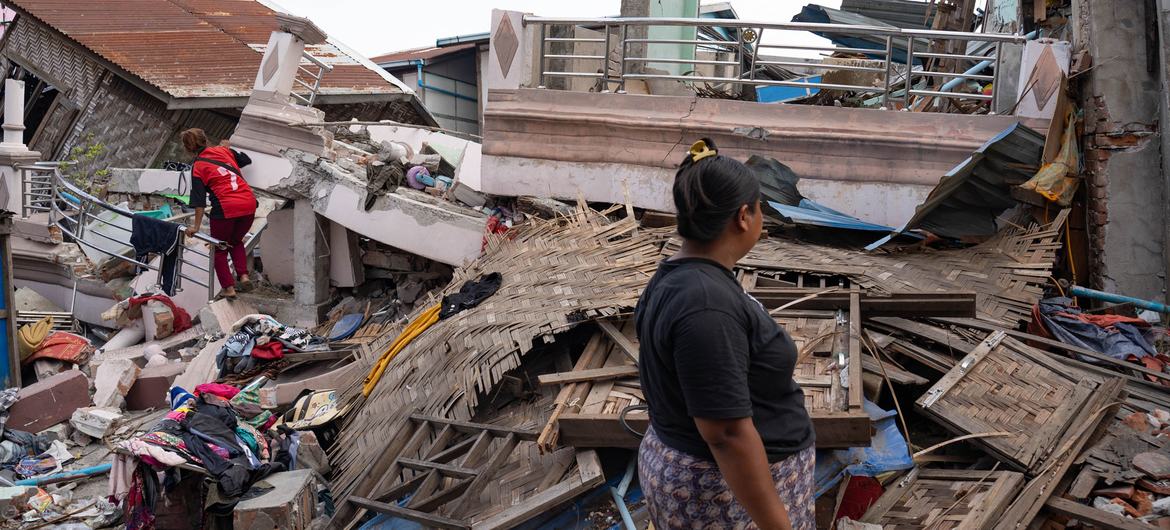 A woman in Mandalay, Myanmar, observes the devastation caused by the earthquake. A woman in Mandalay, Myanmar, observes the devastation caused by the earthquake.