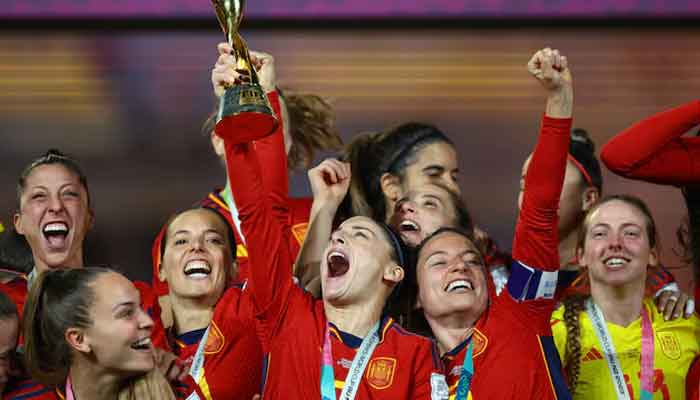 Spain celebrates with the trophy after winning the World Cup. - Reuters/file