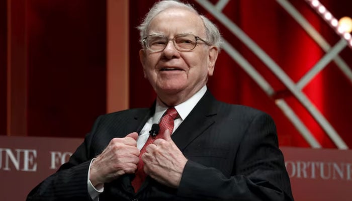 Warren Buffett, president and CEO of Berkshire Hathaway, takes a seat to speak at the summit of the most powerful women of Fortunes in Washington on October 13, 2015. - Reuters