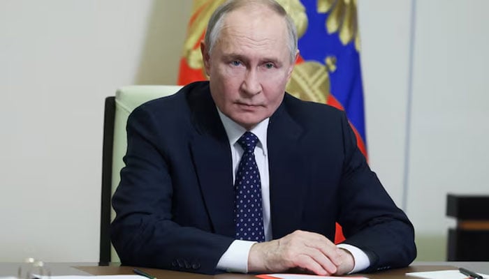 Russian President Vladimir Putin presides over with members of the Security Council through a video link in the state residence of Novo-Aagatov out of Moscow, Russia, on March 14, 2025.-Reuters