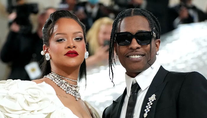 Rihanna waiting for the third boy with a couple Loap Rocky