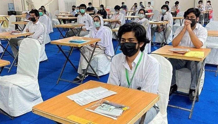 Students appear for Cambridge exams in Karachi.— x/file