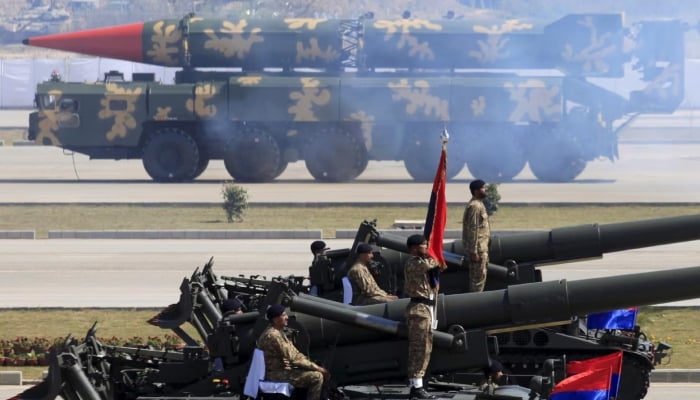 A Hatf-VI missile (Shaheen-II) (Background) is shown during the Pakistan Day parade in Islamabad on March 23, 2015.-Reuters