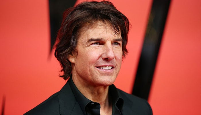 Tom Cruise makes fun of the films papers that he is still chasing