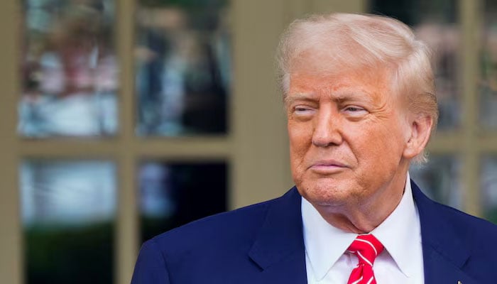 The president of the United States, Donald Trump, observes as comments outside the west wing of the White House in Washington, DC, USA, May 8, 2025. - Reuters