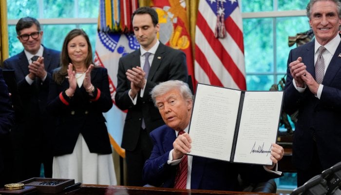 The president of the United States, Donald Trump, has an executive order signed in the White House in Washington, DC, USA, May 23, 2025. - Reuters