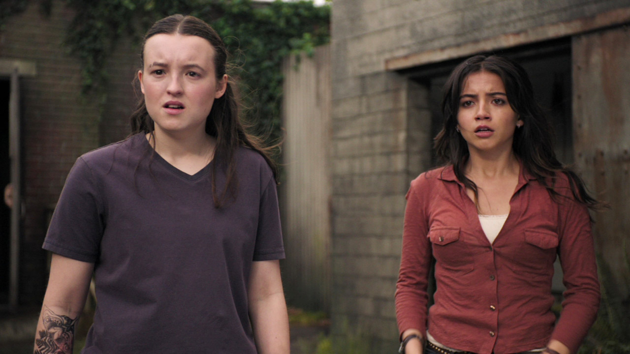 Ellie and Dina standing and looking surprised in the last season 2 of season 2
