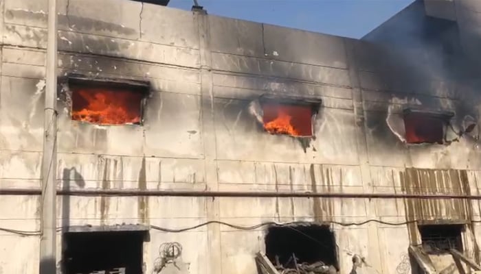 The fire comes out in Factory in Landhi Export Processing Zone, Karachi, on June 8, 2025. - Screengrab through PakGazette News