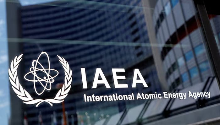 The logo of the International Atomic Energy Agency (OIEA) is seen at its headquarters during a meeting of the Board of Governors, in the midst of the coronavirus disease outbreak (COVID-19) in Vienna, Austria, June 7, 2021.-Reuters