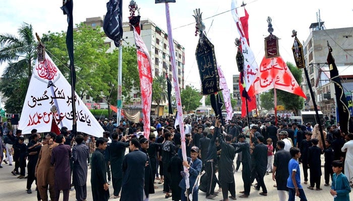 A large number of mourners attending the procession of Ashura in the ninth Muharramul Haram in Latifabad, Hyderabad, on July 28, 2023.