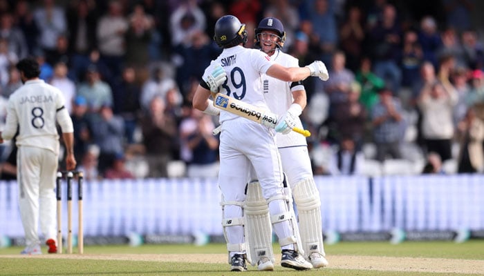 England Joe Root and Jamie Smith celebrate the first test between England V India in Headingley Cricket Ground, Leeds, Great Britain on June 24, 2025. - Reuters