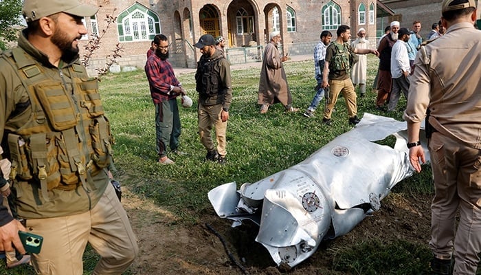Metal debris are found in the field in Wuyan in India Jammu and Cashmir