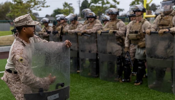 The American marines with the 2nd Battalion, 7th Marine Regiment, 1st Marine Division, which were placed in an alert state during the weekend, rehearse the crowd control tactics on a base in the metropolitan area of Los Angeles, California, USA, UU., June 10, 2025.