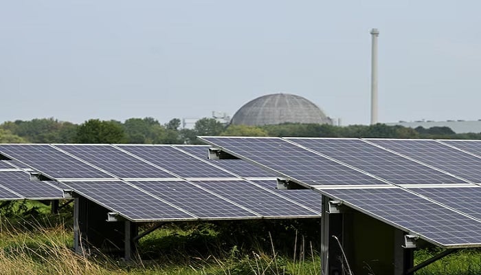 A general view of a solar park in front of the Unterweser Nuclear Plant in Stadland, Germany, on August 26, 2022.