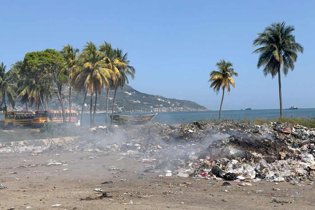 The garbage burns on the coast of Haiti. The garbage burns on the coast of Haiti.