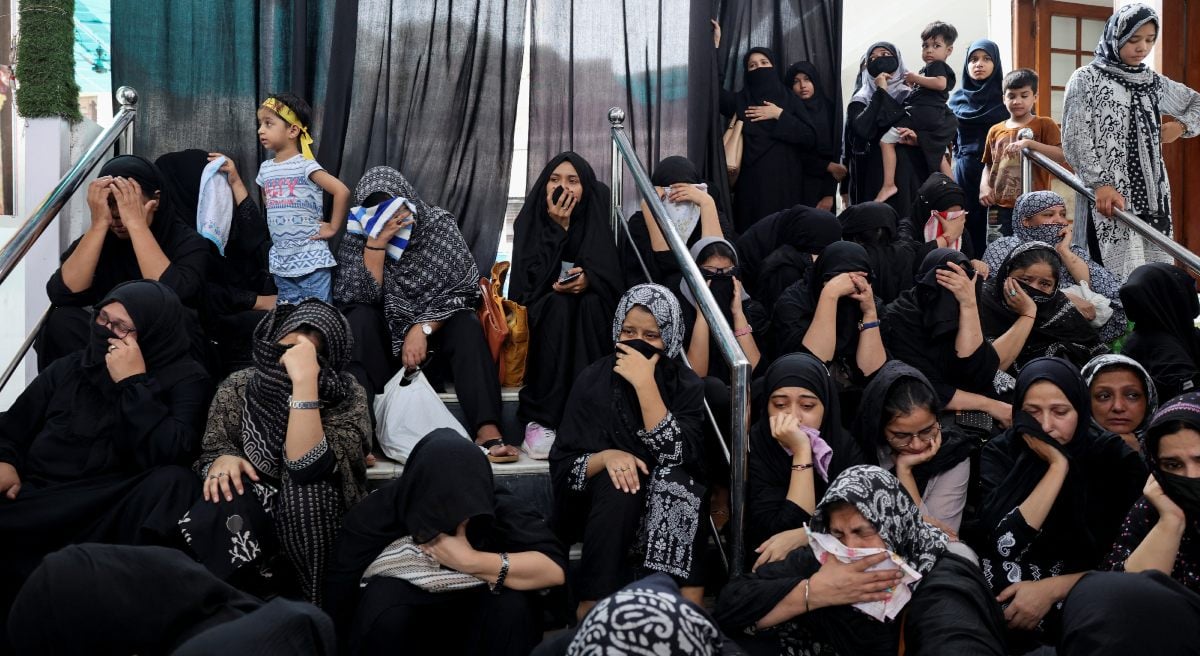 Women cry during the commemoration of Ashura in New Delhi, India, July 6, 2025. - Reuters