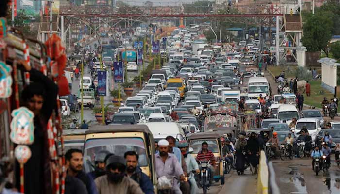 A general view shows road traffic during the Monzonian rain in Karachi, Pakistan, on July 5, 2022. - Reuters