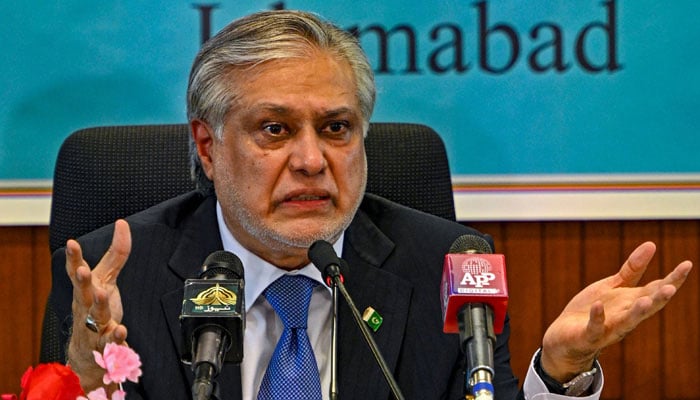 Foreign Minister Ishaq speak while presenting the economic report for fiscal year 2022-23, in Islamabad on June 8, 2023.-AFP