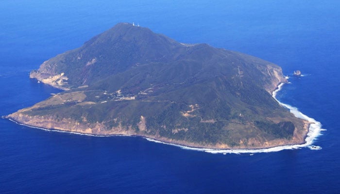 An aerial photo shows Akusekijima, which is one of the Tokara islands in the village of Toshima, the prefecture of Kagoshima, the western region of Japan and Kyusyu, on December 11, 2021. - AFP
