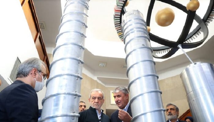 The president of Irans, Masoud, fishshkian, visits the exhibition of Irans nuclear achievements in Tehran, Iran, April 9, 2025. - Reuters