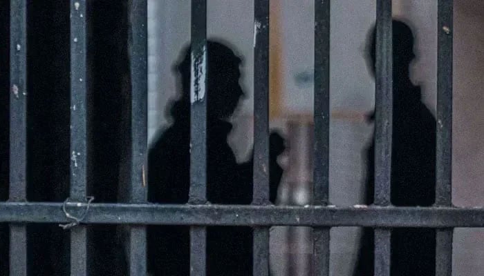Representative image of inmates behind the prison bars. - Unspash/File