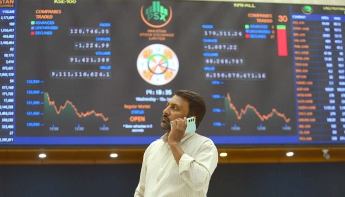 The runners are busy in trade in the Pakistan Stock Exchange in Karachi on Monday, July 14, 2025. - PPI