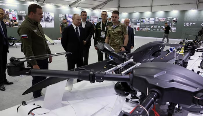 Russian President Vladimir Putin turns an exhibition of military hardware organized by the political movement of the Popular Front of All-Russia, in Moscow, Russia July 6, 2025.-Reuters