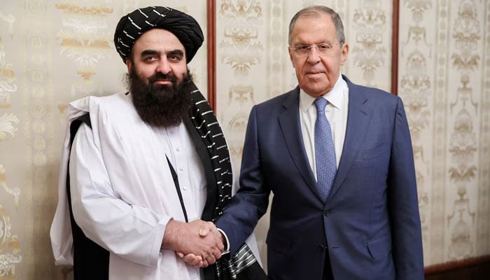Russian Foreign Minister Sergei Lavrov, handles himself with Afghanistans Foreign Minister, the Taliban Movement Amir Khan Muttaqi during a meeting in Moscow, Russia, October 4, 2024. - Reuters