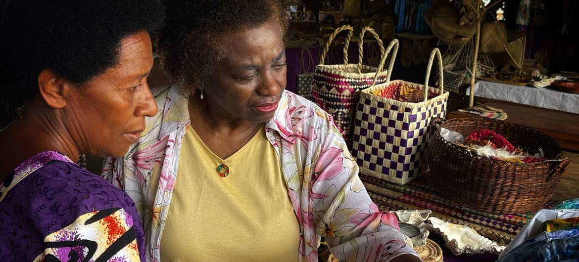 The executive director of UNFPA, Natalia Kanem (center) visits the Mamas market in Port Vila, Vanuatu. The executive director of UNFPA, Natalia Kanem (center) visits the Mamas market in Port Vila, Vanuatu.