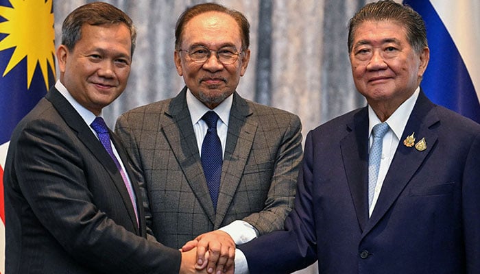 The Prime Minister of Cambodias, Hun Manet, the Prime Minister of Malaysias, Anwar Ibrahim and Thailand, the interim prime minister Phumtham Wechayachai shake hands in Putrajaya, Malaysia, on July 28, 2025. - Reuters