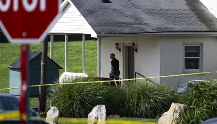 Police evaluates the scene after a shooting in the Baptist church of Richmond Road on July 13, 2025, in Lexington, Kentucky, USA.