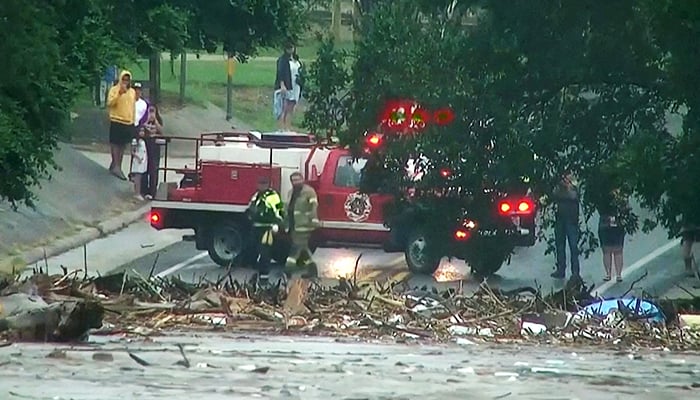 The survey of the first to respond to the growing waters of the flood of the Guadalupe River after sudden floods in Kerr County, Texas, USA July 4, 2025 in a fixed video image. - Reuters