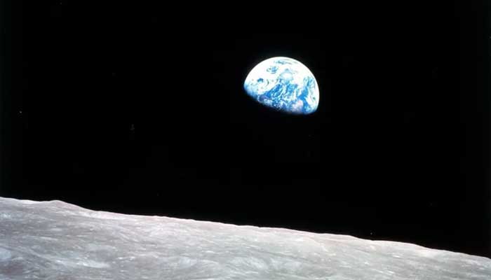Earthrise photographed by Apollo 8 William Anders astronaut, December 1968, with the Earth in the Gibosa phase as seen from the moon. - NASA/File