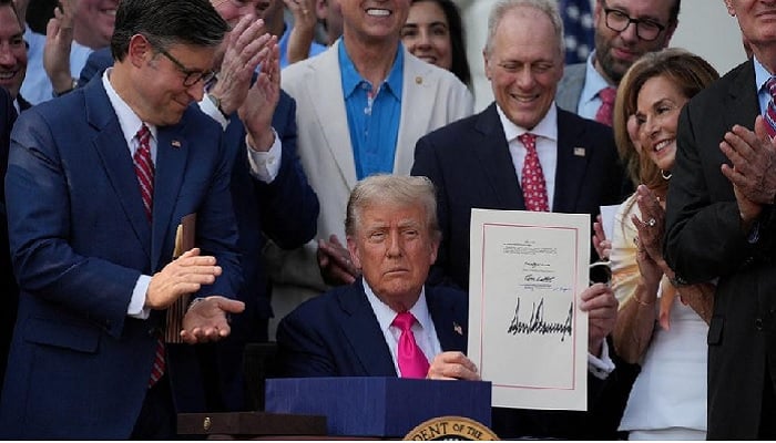 The president of the United States, Donald Trump, signs the broad legislation of expenses and prosecutors, known as a great bill law, in the White House in Washington, DC, USA, July 4, 2025. - Reuters