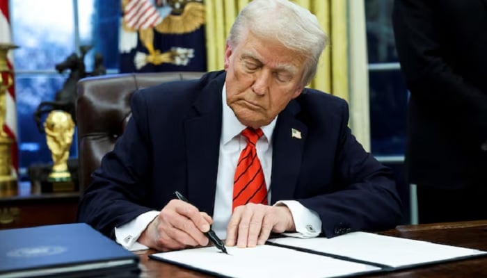 President Donald Trump signs an executive order at the Oval Office of the White House in Washington, USA, February 10, 2025.— Reuters