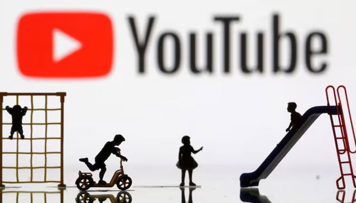 The miniatures of the child recess patio are seen in front of the YouTube logo exhibited in this illustration taken on April 4, 2023. - Reuters