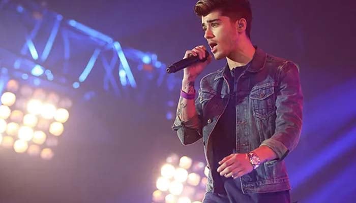 Zayn Malik shows a shadow to an address on the next track