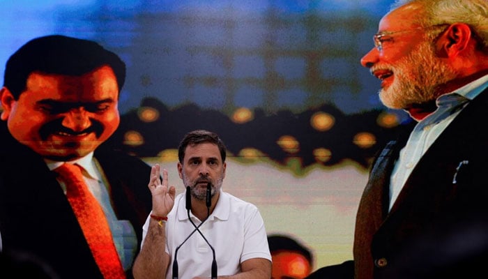 INCS Rahul Gandhi Estures during a press conference on Indian billionaire Gautam Adani accused by us. Prosecutors for their alleged role in a scheme to brib