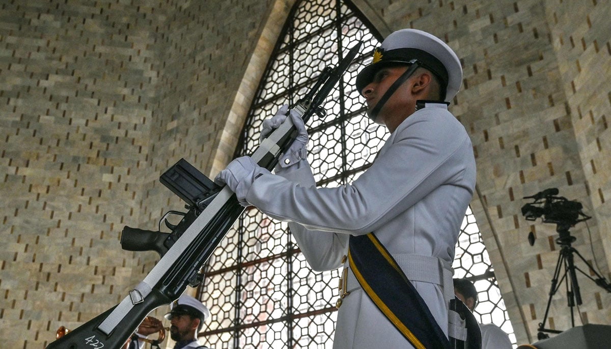 A Pakistani naval cadet is guard at the mausoleum of Muhammad Ali Jinnah, during the celebrations of Independence Day in Karachi on August 14, 2025. - AFP