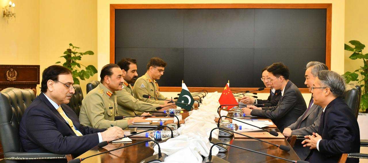 Chinese Foreign Minister Wang Yi, the led delegation (right) meets with the field marshal also in Islamabad on August 22, 2025.-ISPR